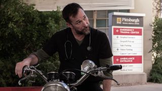 Robby glaring at somebody on his motorcycle in The Pitt 2x14