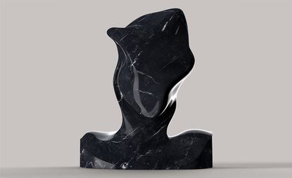 Image of Futurismo Nero Maquina. A large smooth black marble sculpture.