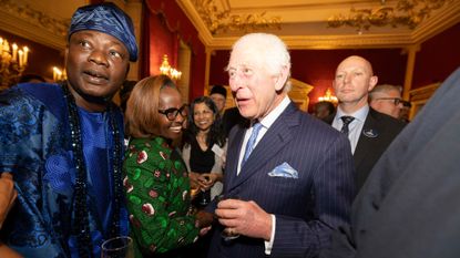 King Charles mingles with attendees during a reception at St. James&#039;s Palace to celebrate the Commonwealth