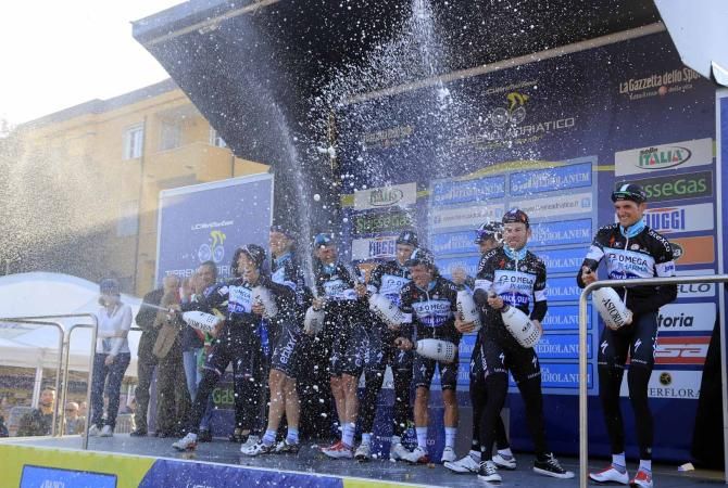 Omega Pharma-QuickStep celebrate victory at the Tirreno-Adriatico team time trial.