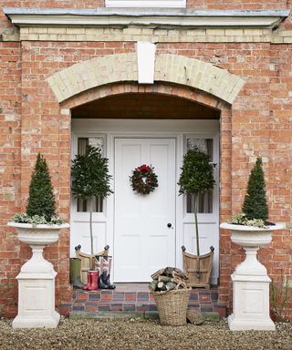Front porch and door with christmas outdoor decorations