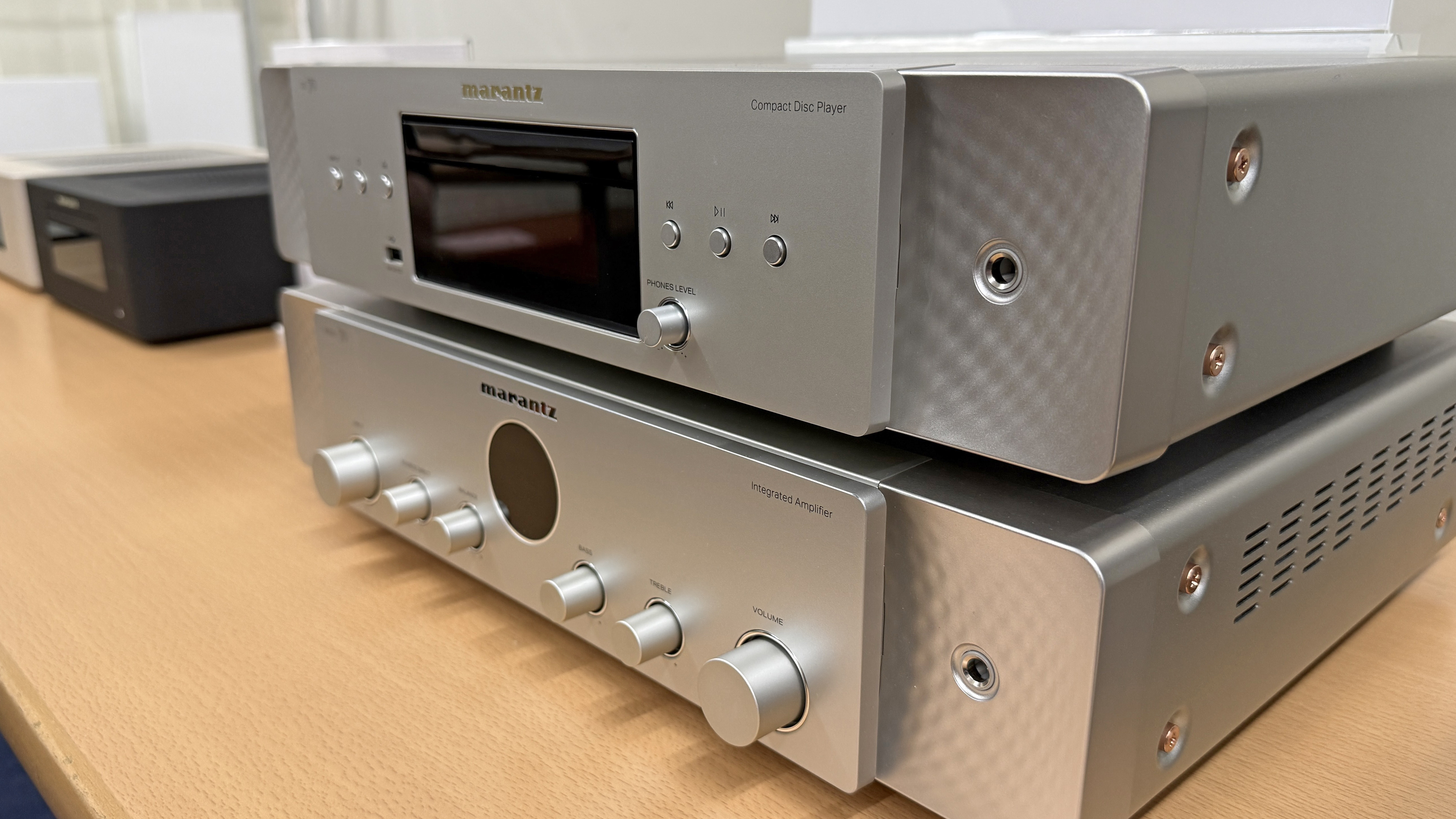 Marantz Model 70 amp and CD 70 CD player on a wooden surface
