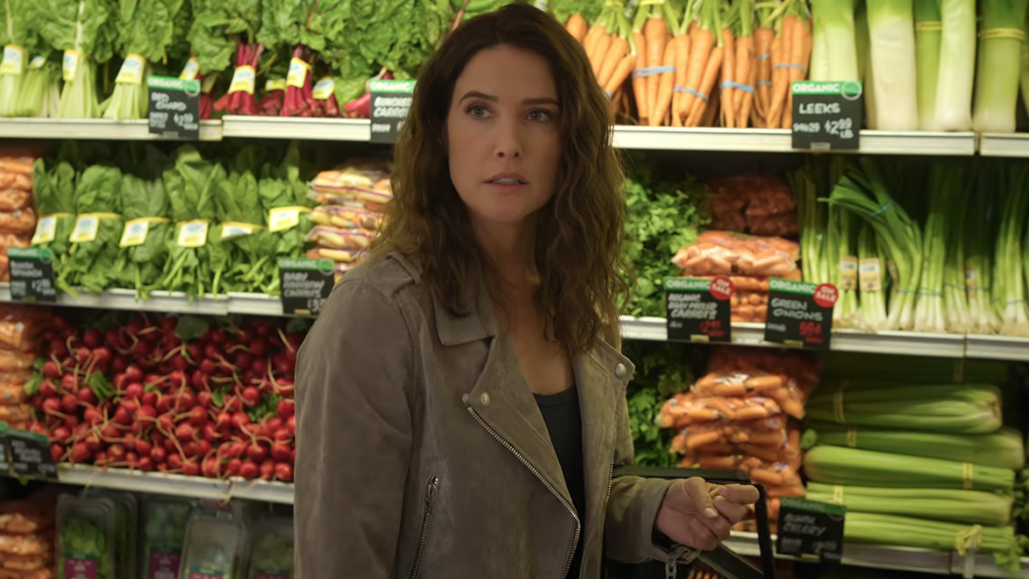 Cobie Smulders standing in front of produce in The Lincoln Lawyer.