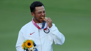 Xander Schauffele with the Olympics gold medal