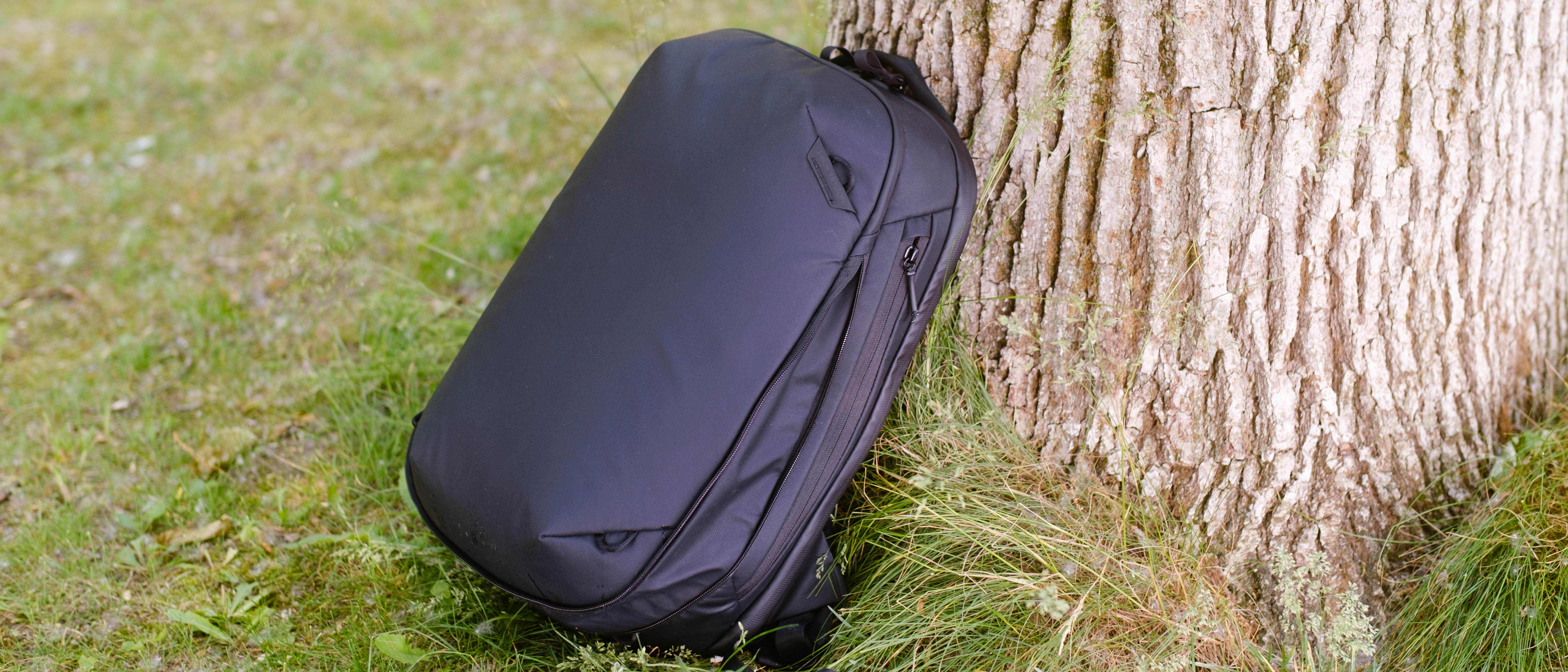 The Peak Design Travel Backpack 20L in use by a photographer