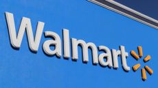 Closeup of the Walmart logo on a store