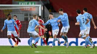 Man City’s Phil Foden celebrates his goal against Liverpool at Anfield