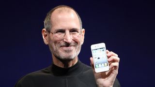 Steve Jobs launches the iPhone 4, holding it right