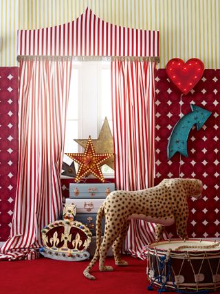 kids room with circus curtains in red and white stripes