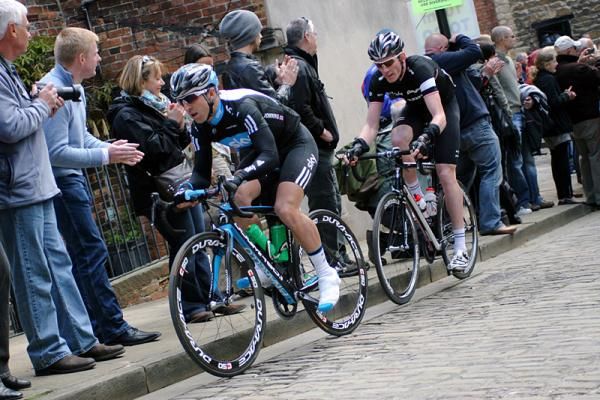 Russ Downing (Sky) attacking on the first climb of Michaelgate and marked already by Rapha Condor.