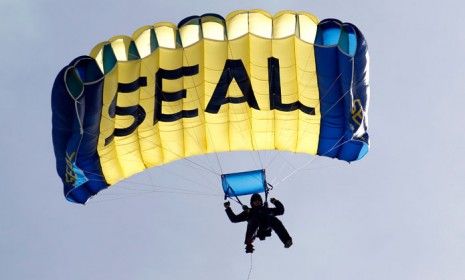 A U.S. Navy SEAL is seen demonstrating combat skills at the UDT-SEAL Museum in Fort Pierce, Florida.