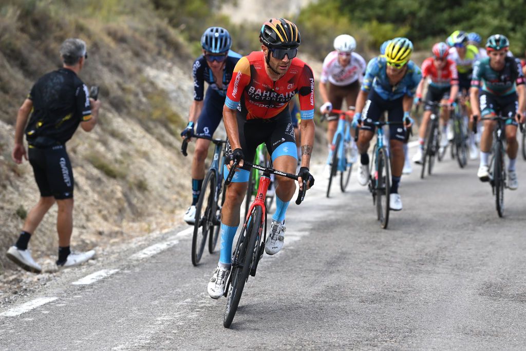 Damiano Caruso (Bahrain Victorious) attacks from the breakaway