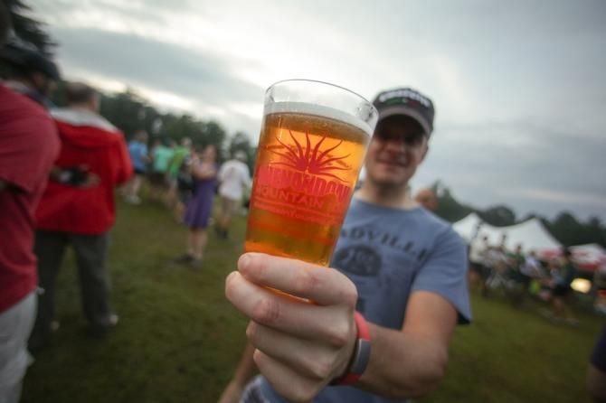 Ben King and Sue Haywood scored wins in the men&rsquo;s and women&rsquo;s fields, respectively, but all finishers earned a coveted SM100 pint glass. Pictured is first-time finisher Christopher Burgess.