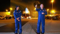 Crew Flight Test NASA astronauts Suni Williams (left) and Butch Wilmore in front of their Boeing Starliner spacecraft. Starliner was rolling out to the pad at NASA's Kennedy Space Center on April 16, 2024.