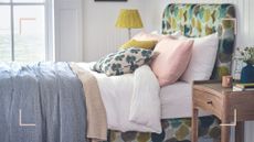 White bedroom with bed layered with blankets to support a guide on how to wash an electric blanket