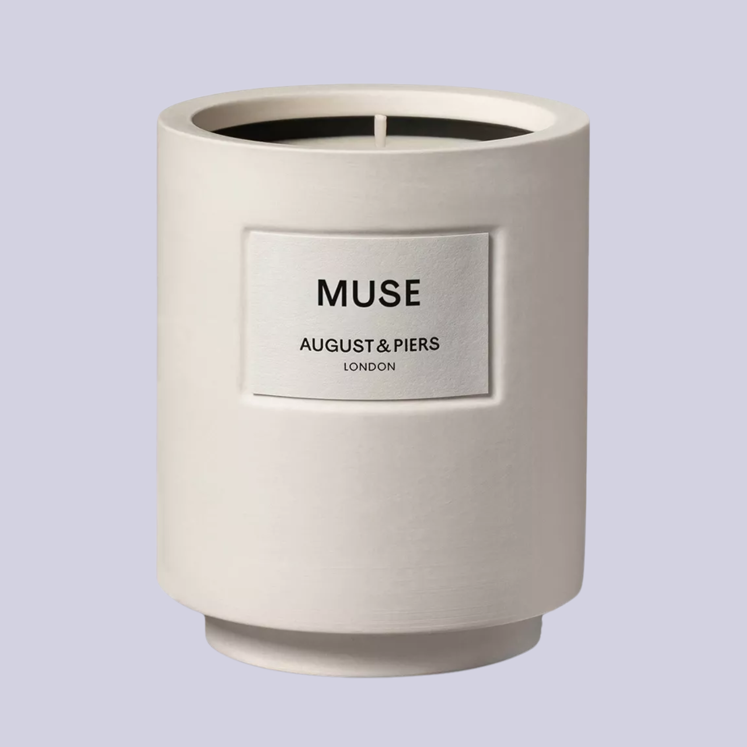 A white ceramic candle