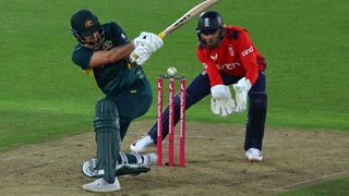 Matthew Short (L), in green, plays a shot during the England vs Australia 1st T20 live stream of 2024.