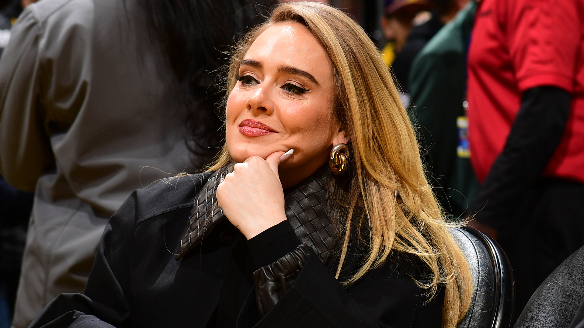 Adele was spotted on vacation wearing a Team England sports jersey, the flip-flops trend, and a Herm&egrave;s Birkin Bag