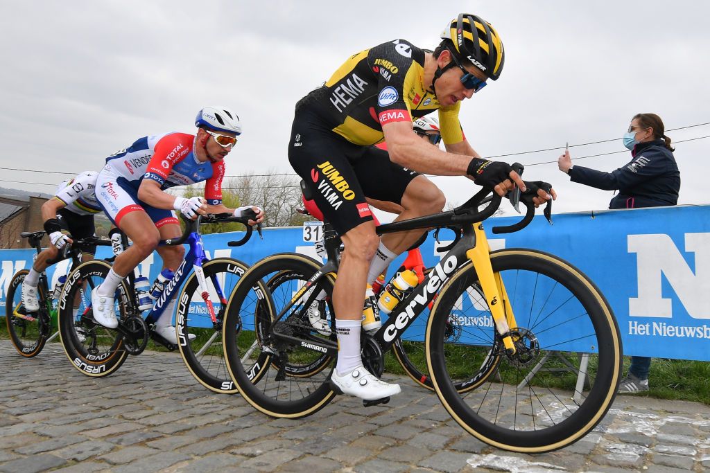 French Anthony Turgis of Total Direct Energie and Belgian Wout Van Aert of Team JumboVisma pictured in action during the 105th edition of the Ronde van Vlaanderen Tour des Flandres Tour of Flanders one day cycling race 254km from Antwerp to Oudenaarde Sunday 04 April 2021 BELGA PHOTO DIRK WAEM Photo by DIRK WAEMBELGA MAGAFP via Getty Images