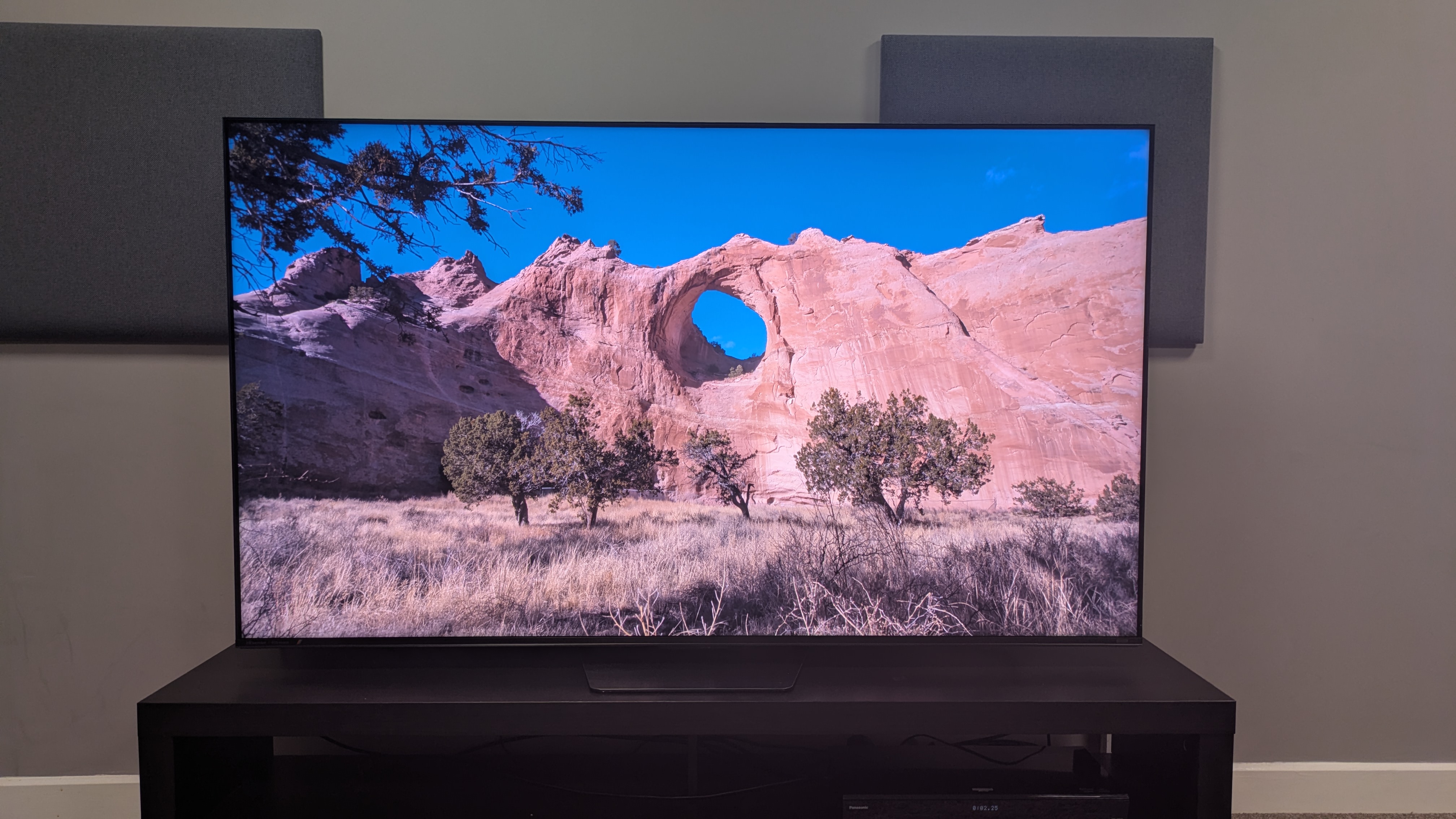 Hisense UR8 showing a bright canyon cliff on screen. The image shows good brightness with accurate colors