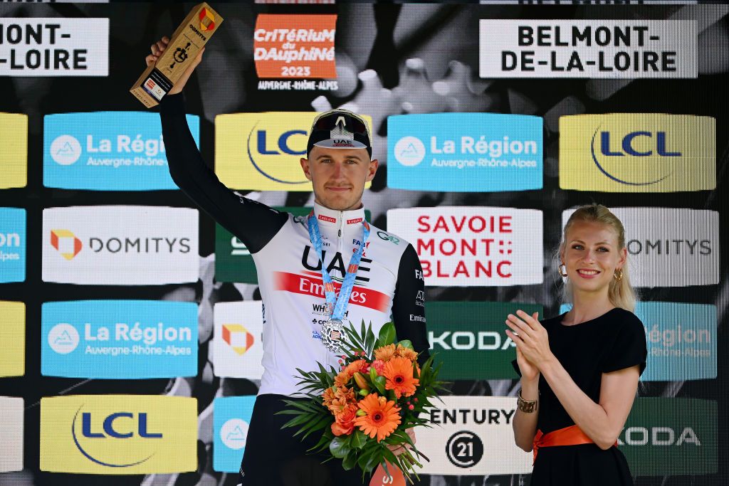 BELMONTDELALOIRE FRANCE JUNE 07 Mikkel Bjerg of Denmark and UAE Team Emirates celebrates at podium as stage winner during the 75th Criterium du Dauphine 2023 Stage 4 individual time trial from Cours to BelmontdelaLoire 482m UCIWT on June 07 2023 in BelmontdelaLoire France Photo by Dario BelingheriGetty Images