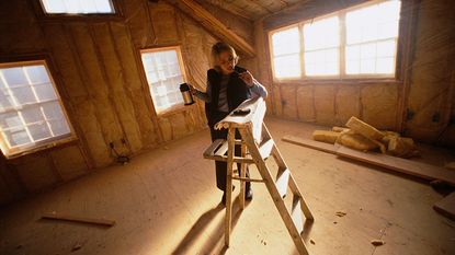 Woman in an unfinished house