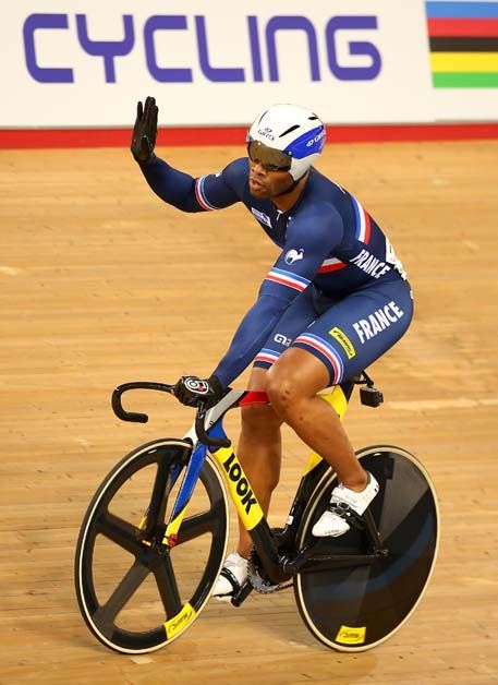 Gregory Bauge waves to the crowd after being knocked out in the sprint