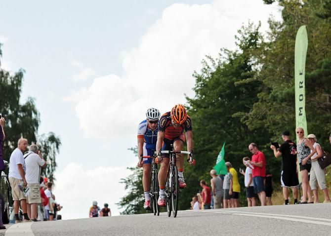 Racers crest a hill