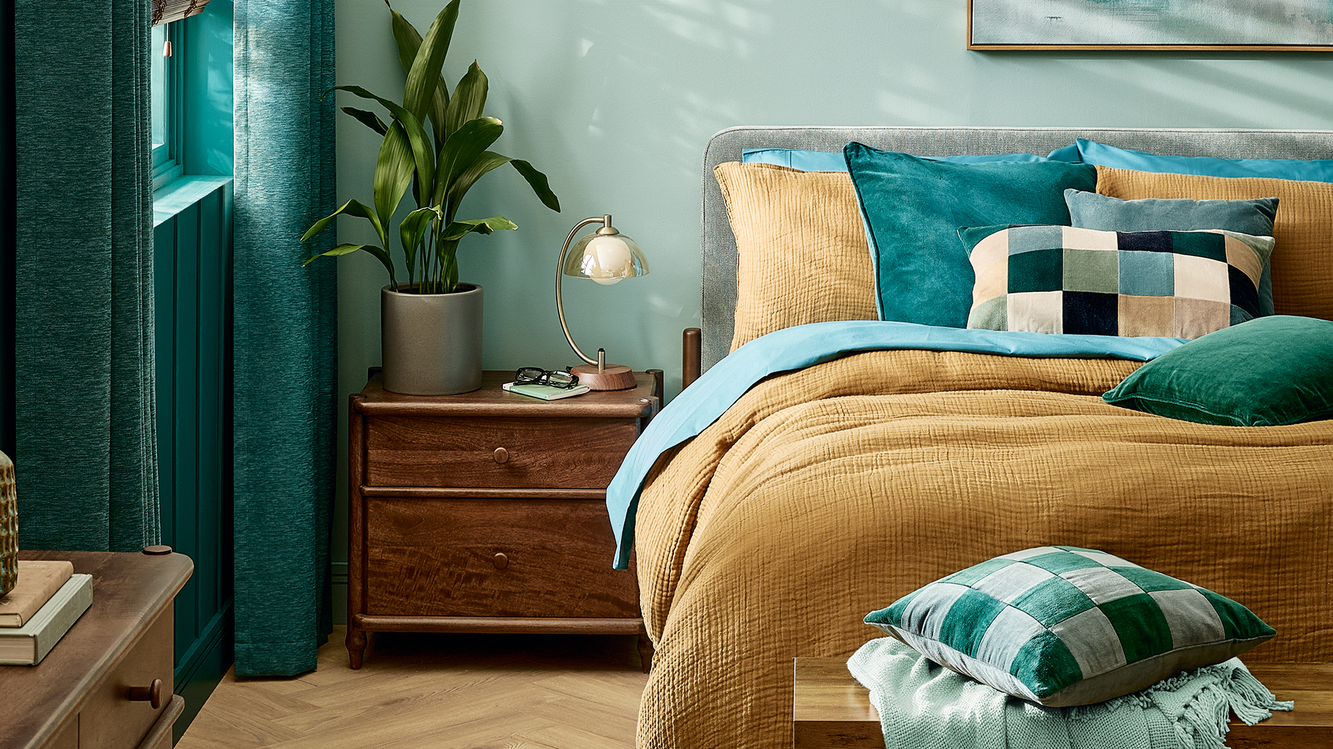 teal and mustard yellow bedroom