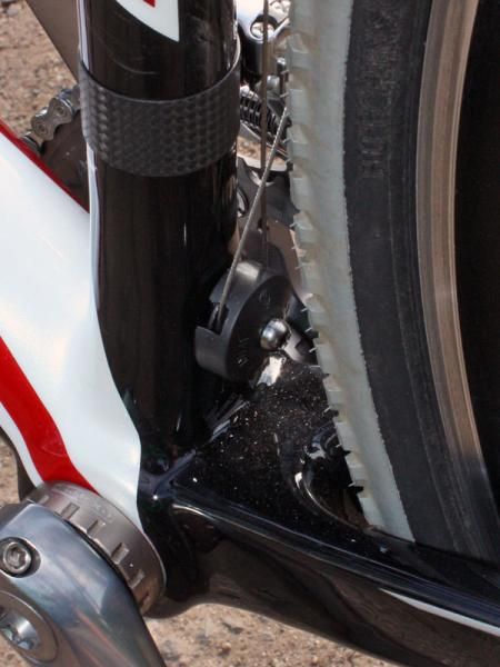 The front derailleur pulley rotates on a bushing, not a bearing, though it's continued to work fine in dry conditions