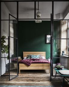 bedroom ideas for men with crittall doors, furniture by by ercol and green wall