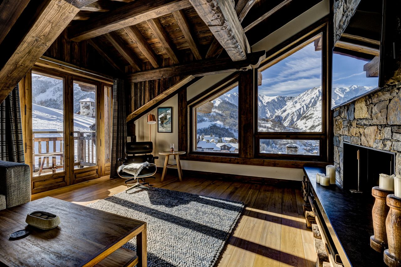 Images of the chalet in St Martin de belleville. lots of wood, lots of stone, lots of snow, lots of luxury