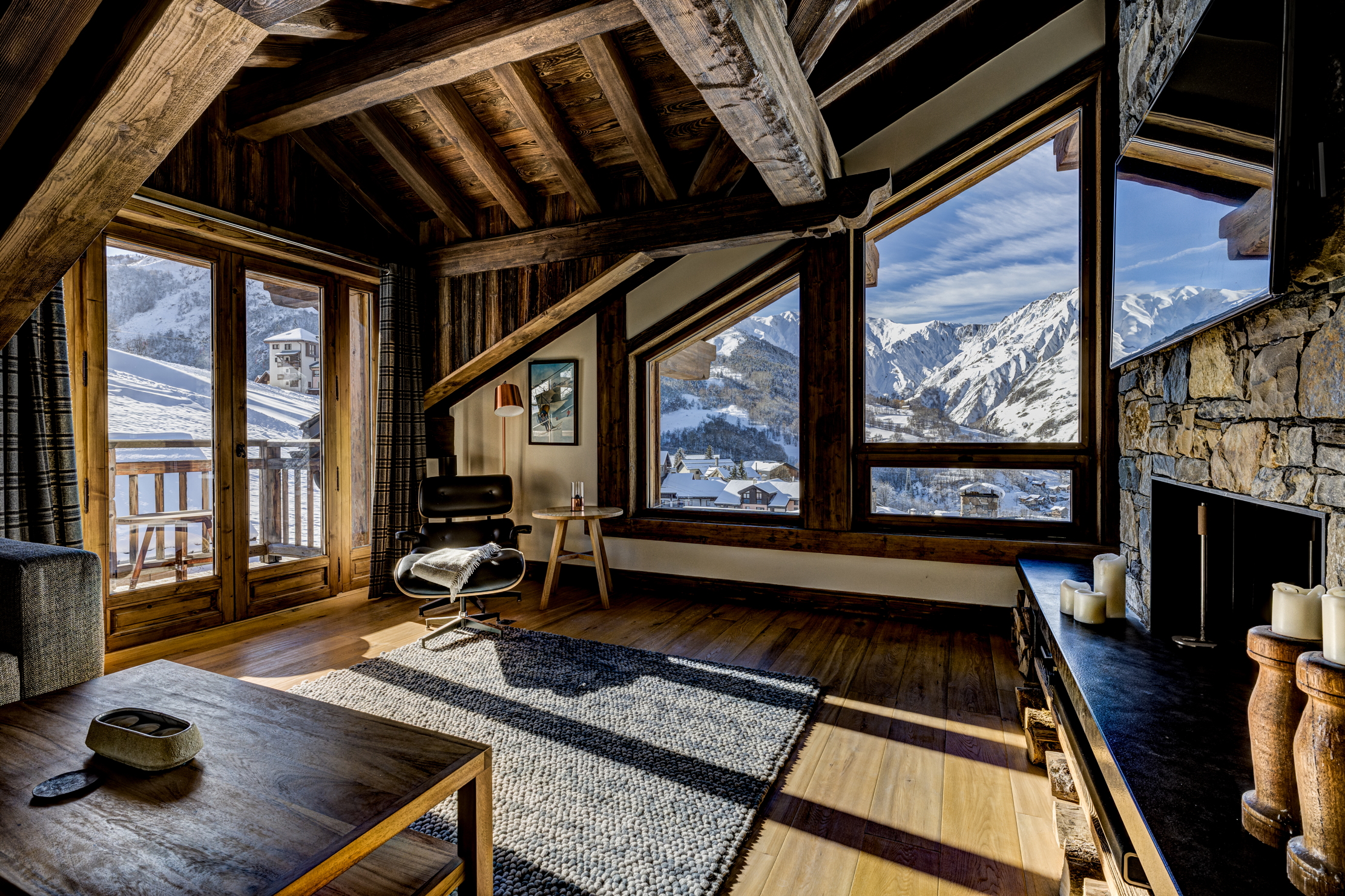 Images of the chalet in St Martin de belleville. lots of wood, lots of stone, lots of snow, lots of luxury