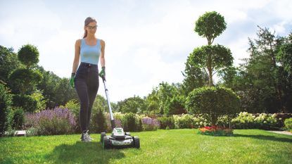 Gtech SLM50 Mini Mower being used on lawn