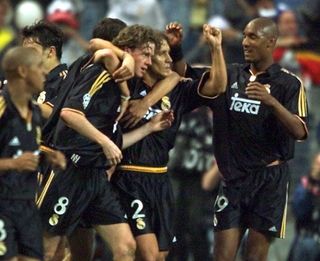 Steve McManaman celebrates with his Real Madrid team-mates after scoring against Valencia in the 2000 Champions League final.