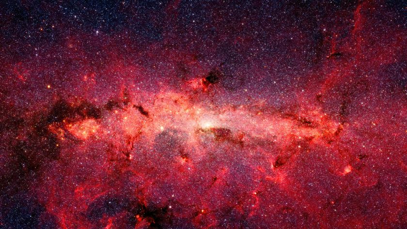 a red field of bright gas on a starry background