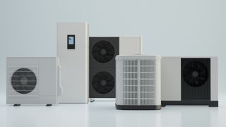 row of heat pumps on plain white floor and background