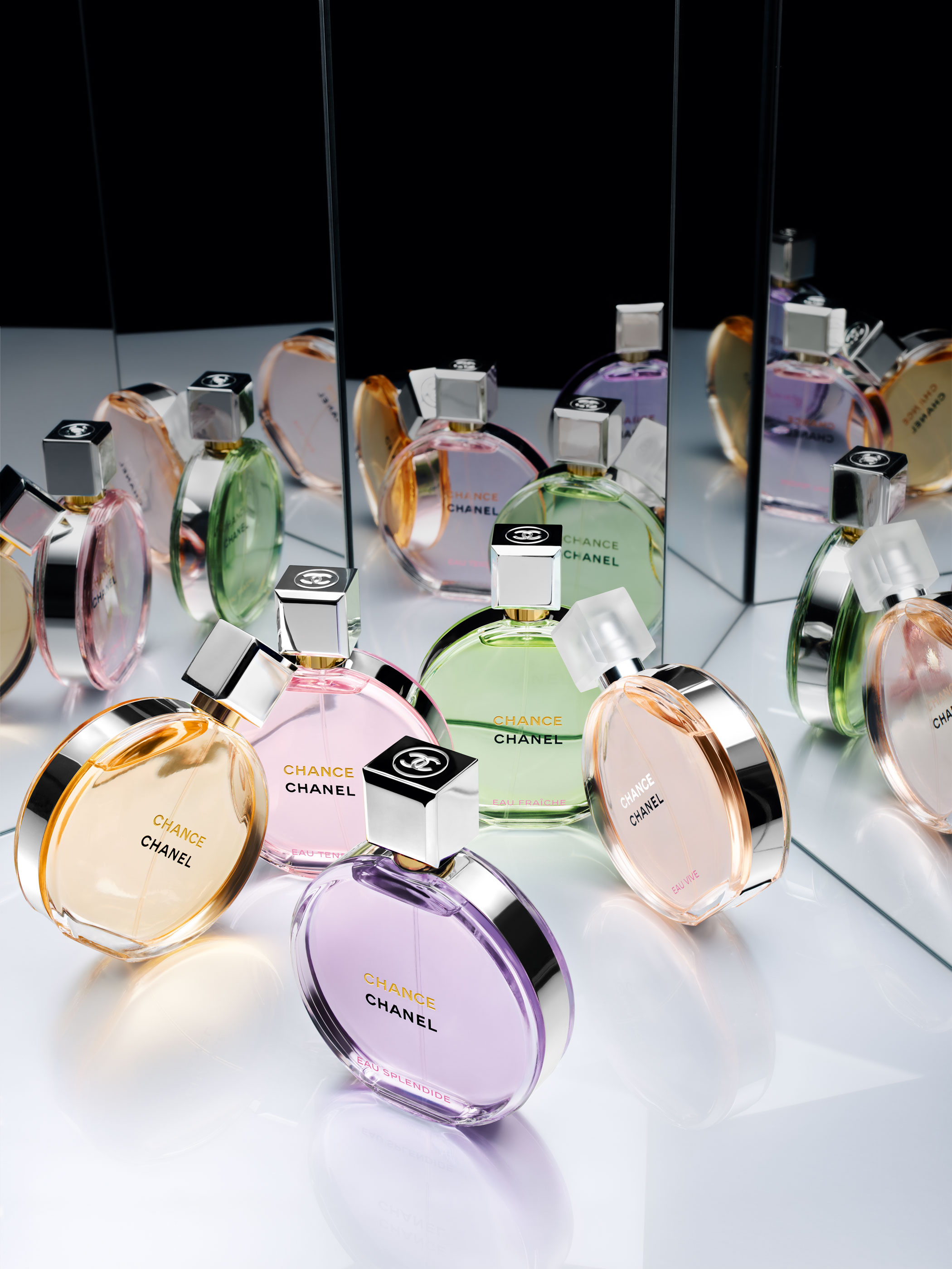 A collection of Chanel Chance perfume bottles.