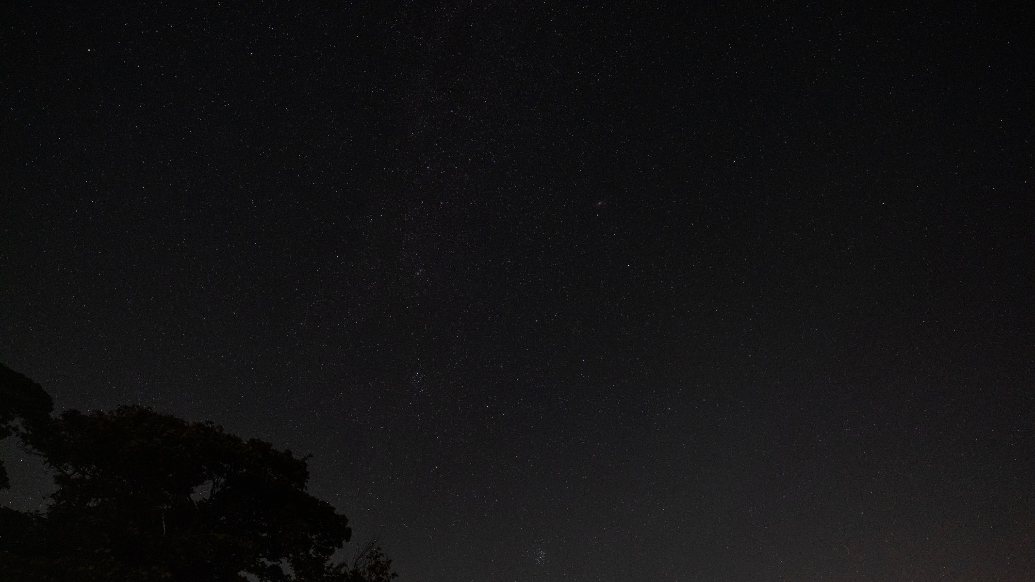 The Pleiades star cluster and the constellation Perseus in the starry night sky, as photographed by the Fujifilm GFX100S II.