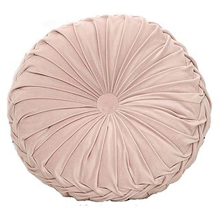 round pink velvet cushion with button