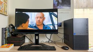 Dell XPS 8960 review unit on desk playing Fast 7 Furious X trailer