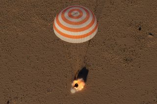 Russia's Soyuz MS-08 spacecraft lands on the steppe of Kazakhstan with cosmonaut Oleg Artemyev and NASA astronauts Drew Feustel and Ricky Arnold on Oct. 4, 2018 after 195 days at the space station.
