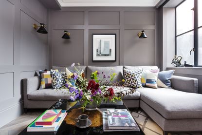 Gray living room with wall paneling