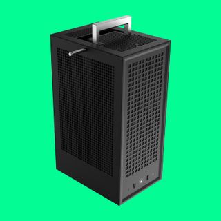 The Hyte Revolt 3 mini-ITX case on a green background