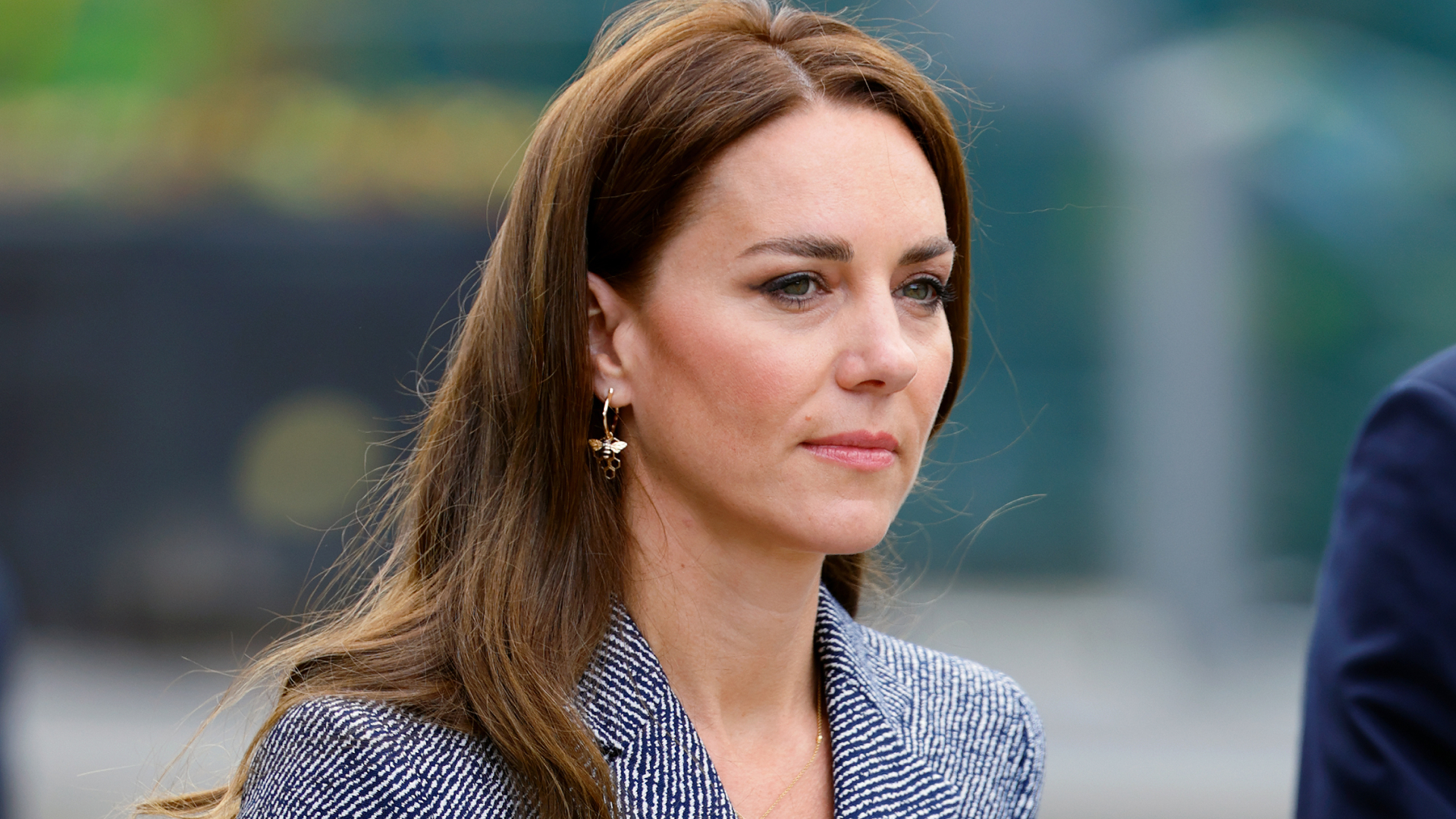 Kate Middleton wears a blue tweed coat dress