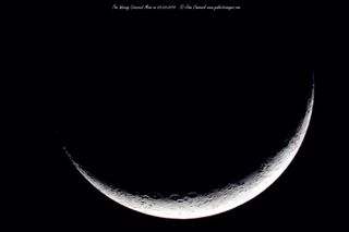 Thin Waxing Crescent Moon by John Chumack