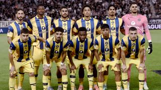 Maccabi team players pose prior to the start of the UEFA Europa League football match day 1, between PAOK Salonika and Maccabi Tel-Aviv at the Toumba Stadium, in Thessaloniki on September 24, 2025. 