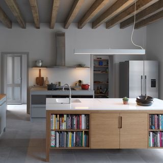 kitchen with wooden beam white worktop