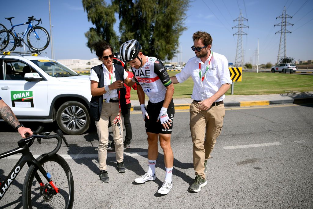 YITTI HILLS OMAN FEBRUARY 14 Ryan Gibbons of South Africa and UAE Team Emirates after crash during the 12th Tour of Oman 2023 Stage 4 a 2049km stage from Izki to Yitti Hills 147m TourofOman on February 14 2023 in Yitti Hills Oman Photo by Alex BroadwayGetty Images