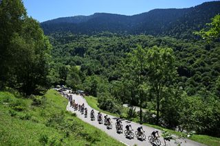 PLATEAU DE BEILLE FRANCE JULY 14 A general view of the peloton climbing to the Col de Mente 1349m during the 111th Tour de France 2024 Stage 15 a 1977km stage from Loudenvielle to Plateau de Beille 1782m UCIWT on July 14 2024 in Plateau de Beille France Photo by Tim de WaeleGetty Images